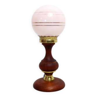 Table lamp in teak and pink glass