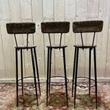 Suite de 3 tabourets de bar en acier et paillés