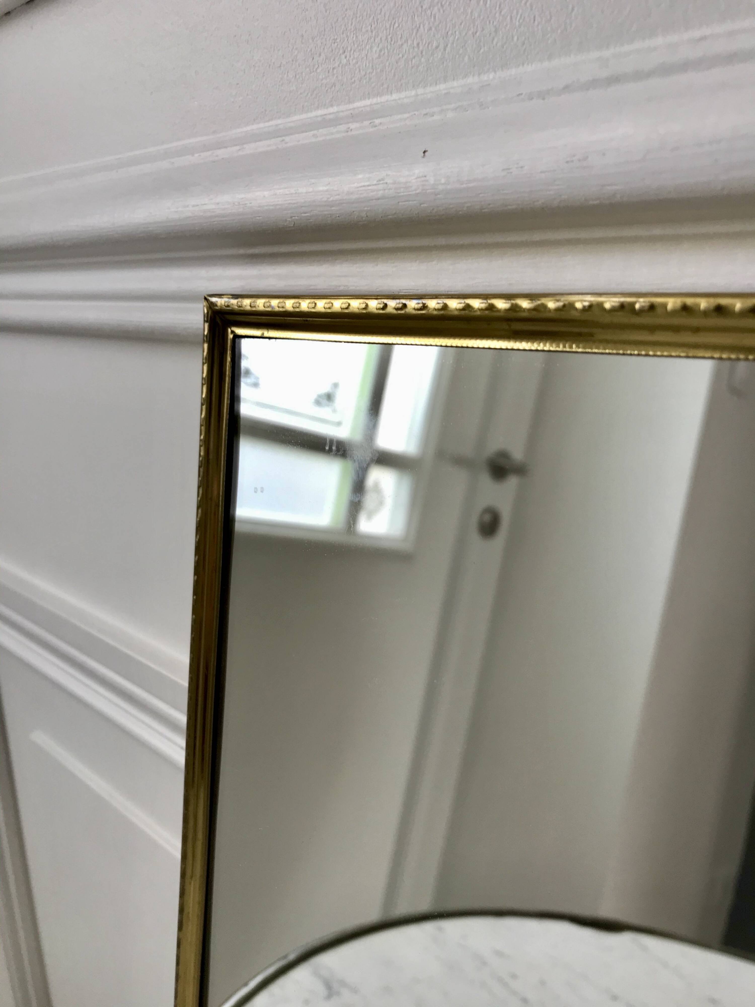Gilded brass mirror from the 40s and 50s