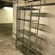 Design in metal chrome and smoked glass shelf