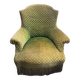 Green velvet toad armchair with wheels and fringes