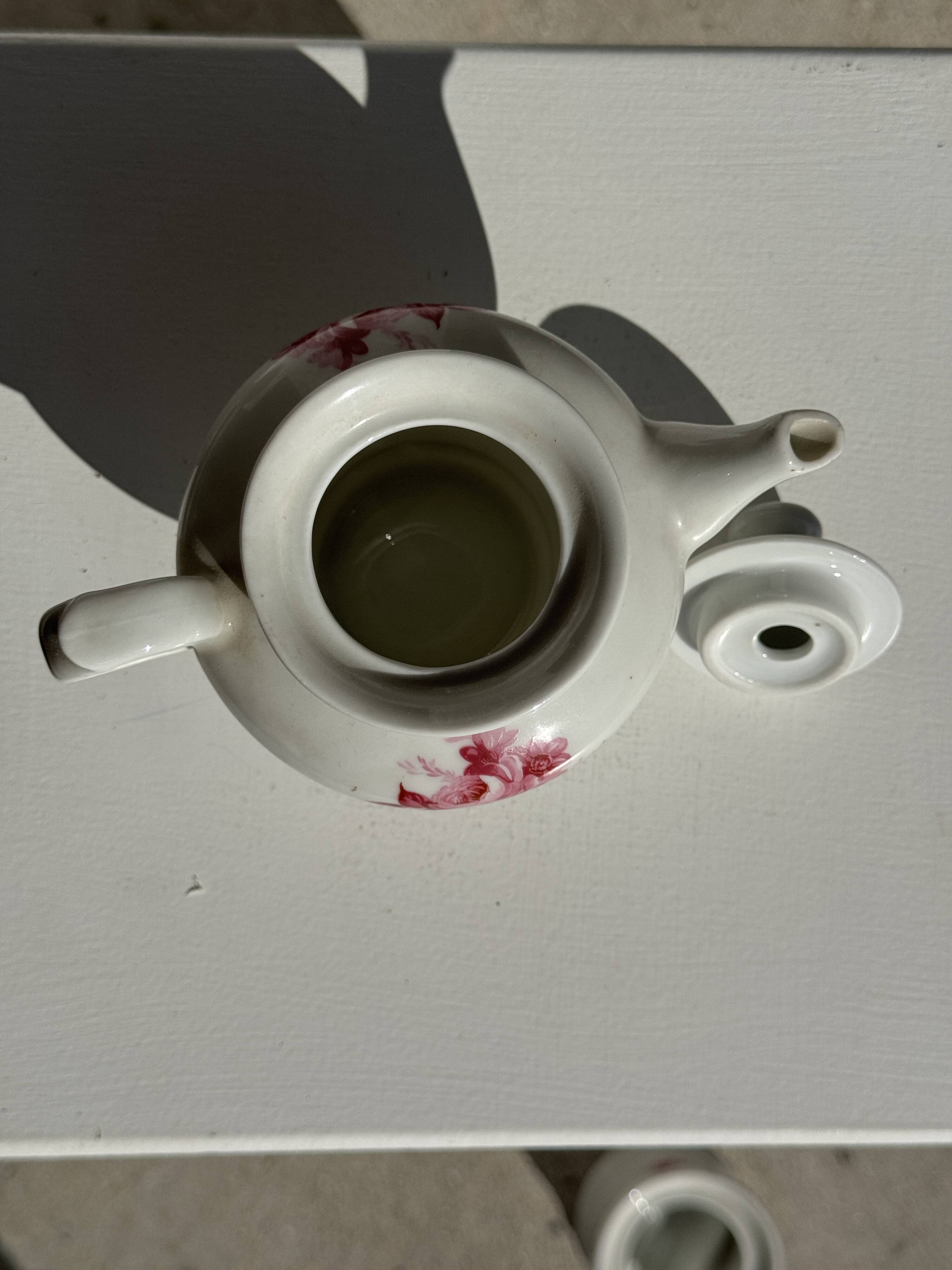 Complete porcelain teapot and warmer with pink floral decoration H18