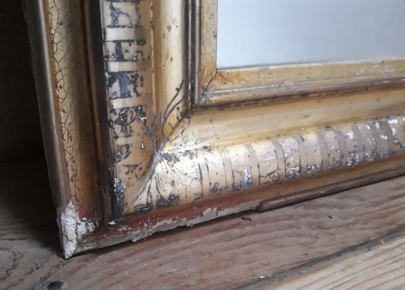 Golden Louis Philippe mirror H122xW84cm with gilded motifs.