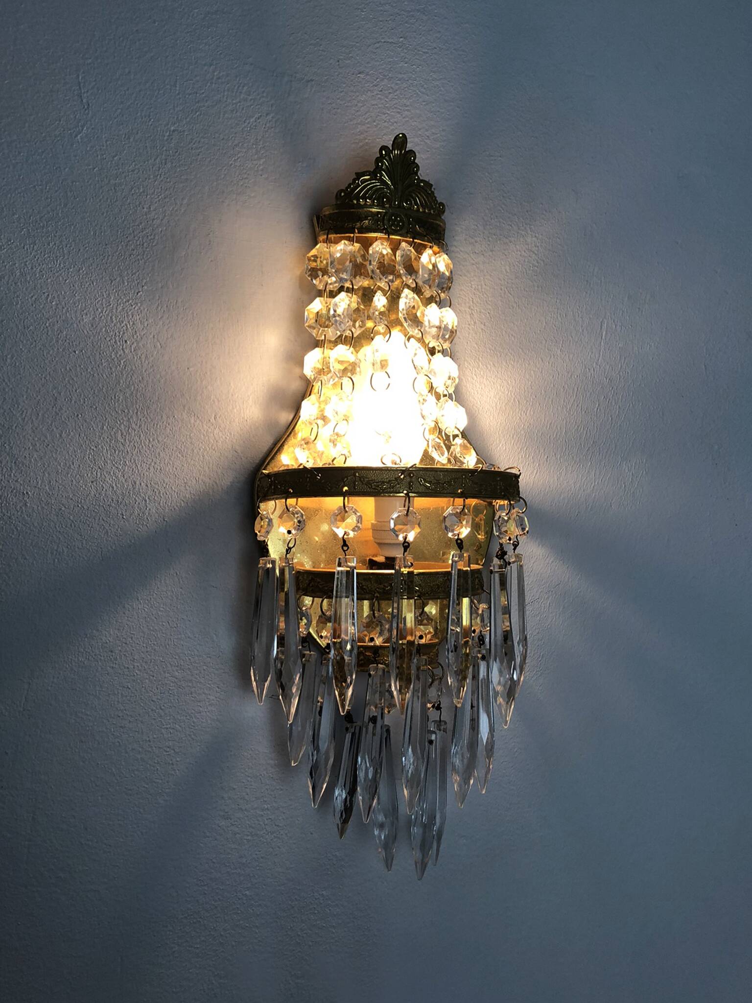 Pair of vintage 3-tiered hot air balloon wall sconces with glass tassels. 1960s