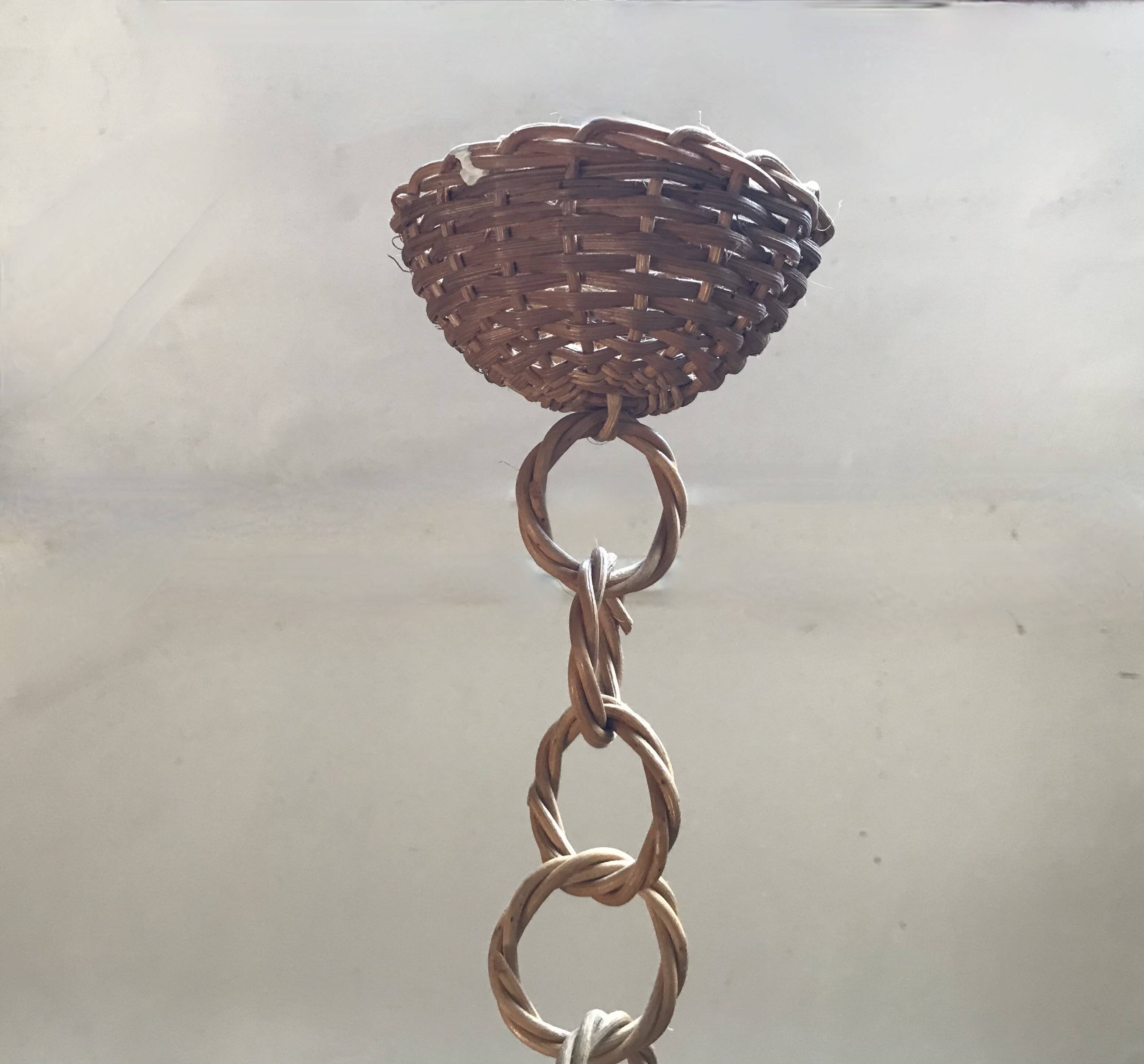 Suspension en rotin des années 50.