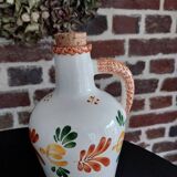 Old earthenware brandy bottle
