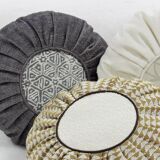 White ruffled cushion