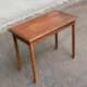 Vintage rectangular side table in solid oak from the 1920s.