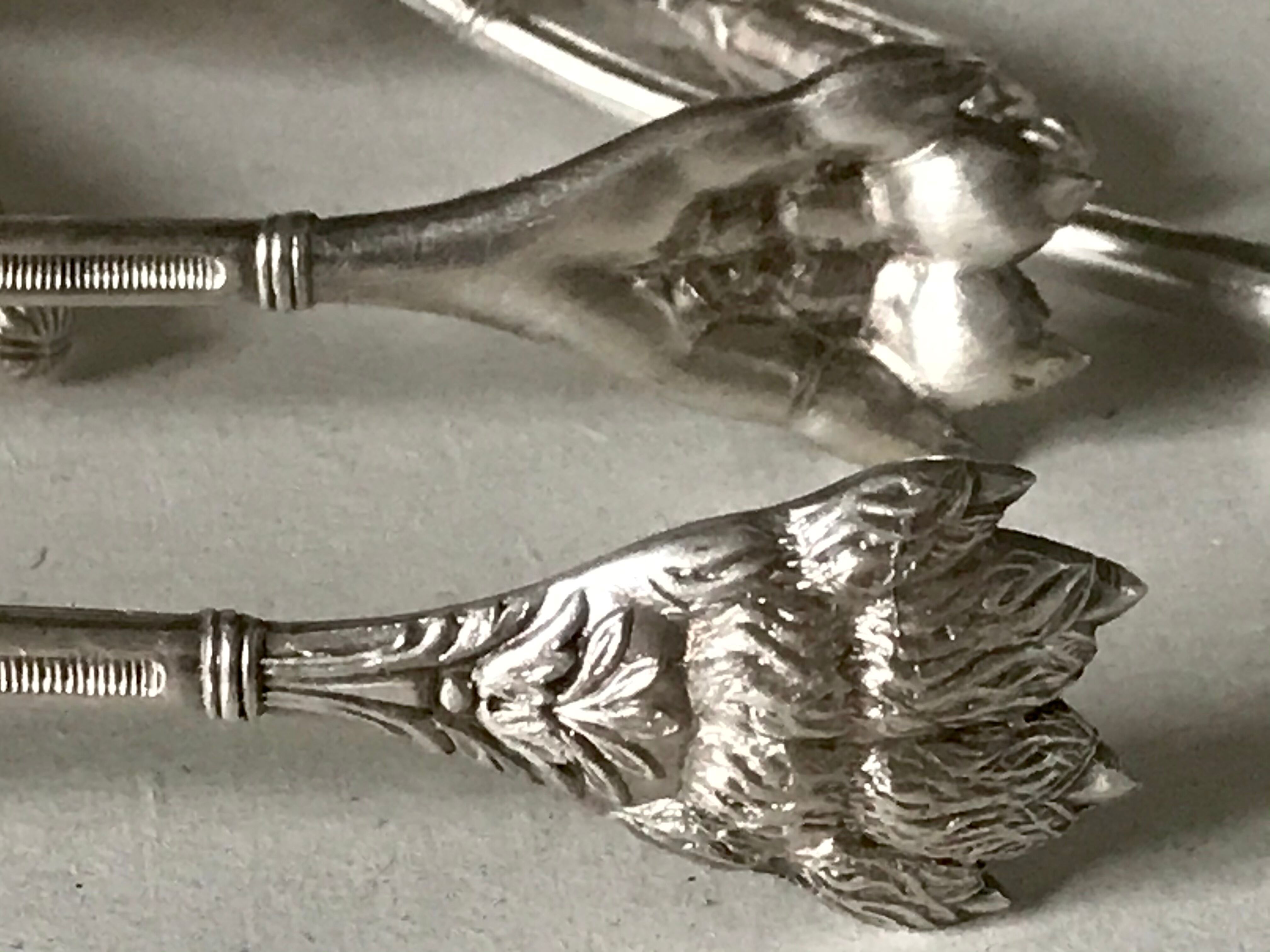 12 teaspoons silver metal