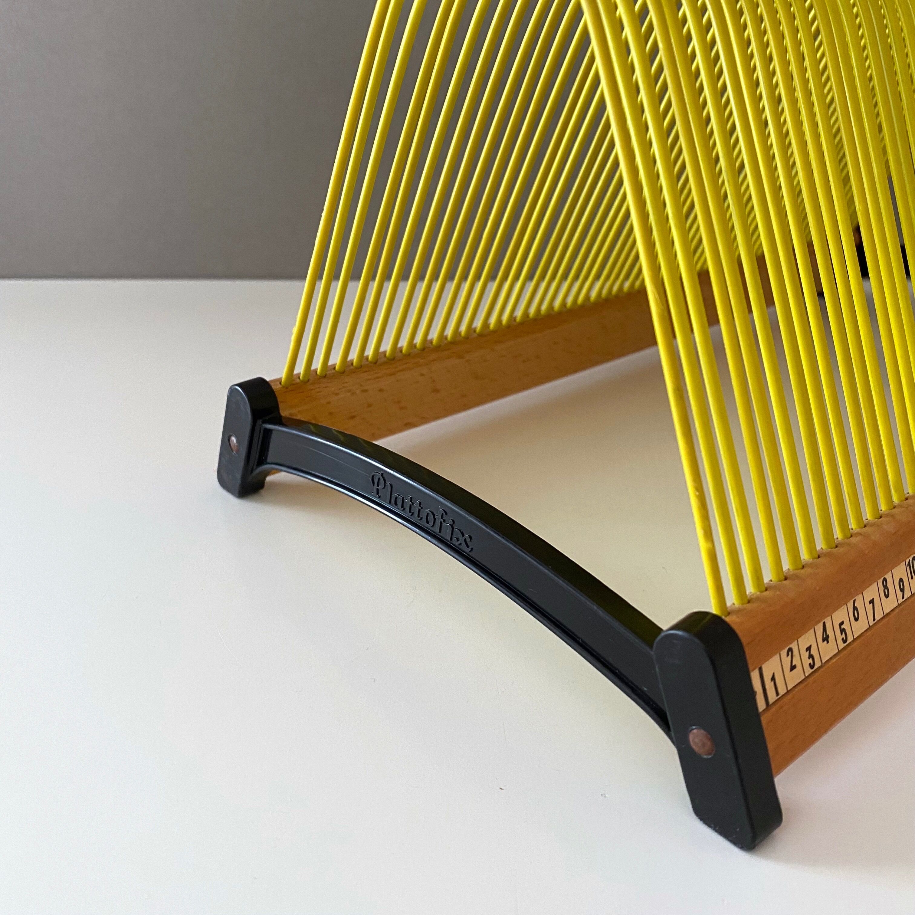 Vintage record stand, vinyl record holder, plattofix germany, yellow 50 records