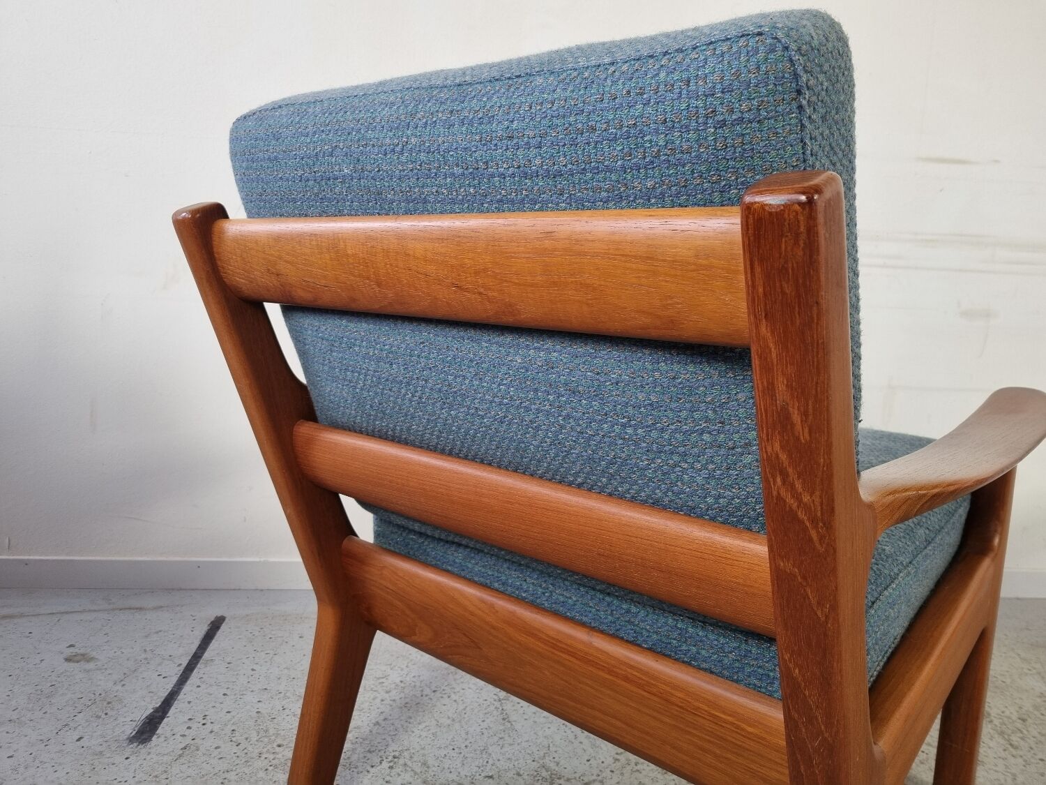 Pair of armchairs and Scandinavian teak ottoman by Juul Kristensen, Denmark 1970s