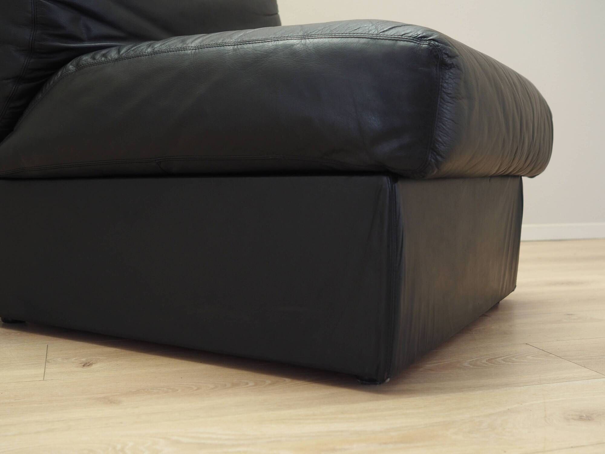 Black leather pouf/armchair, Italian design, 1960s, made in Italy.