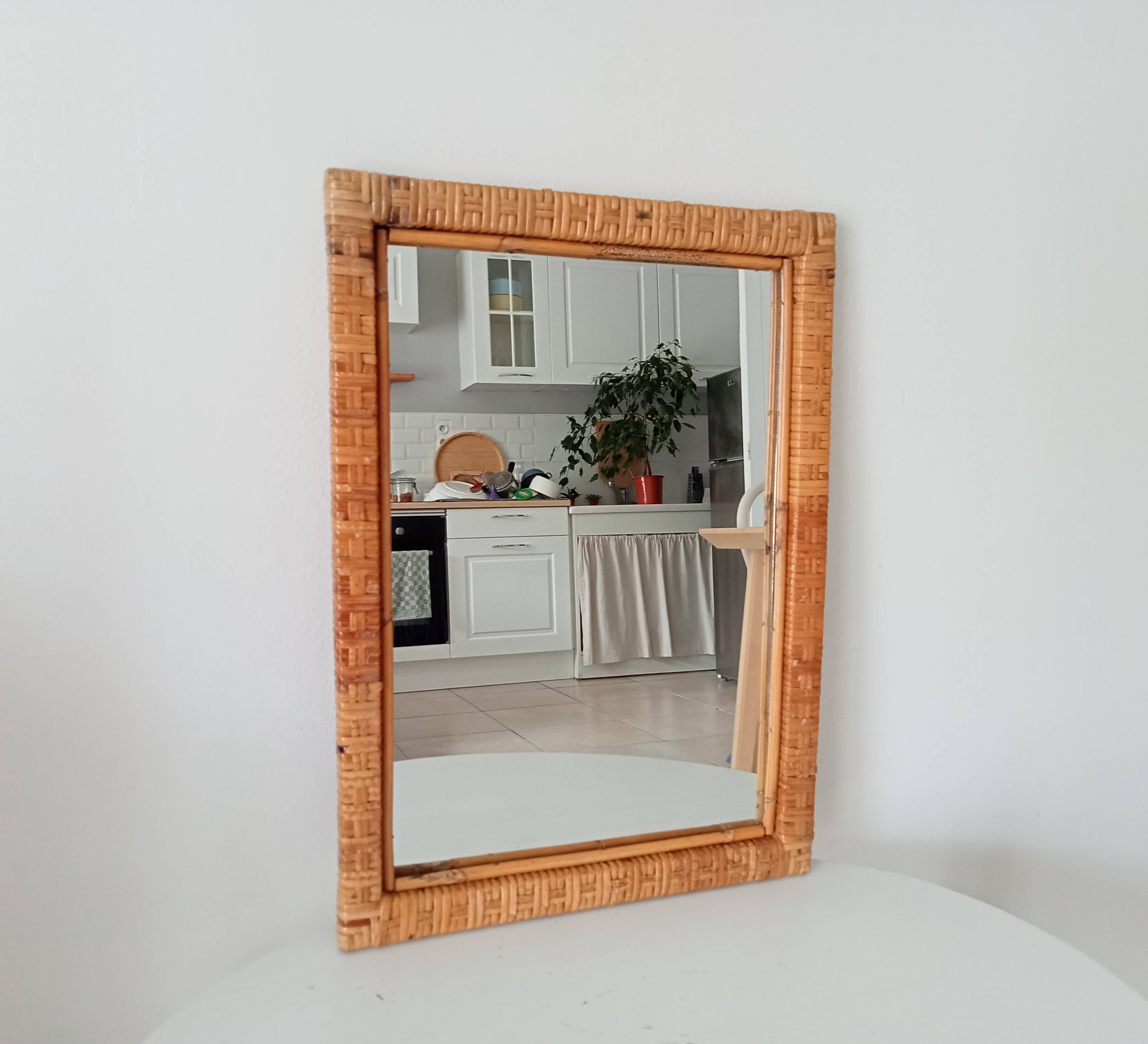 Vintage woven rattan mirror from the 70s.