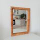 Vintage woven rattan mirror from the 70s.
