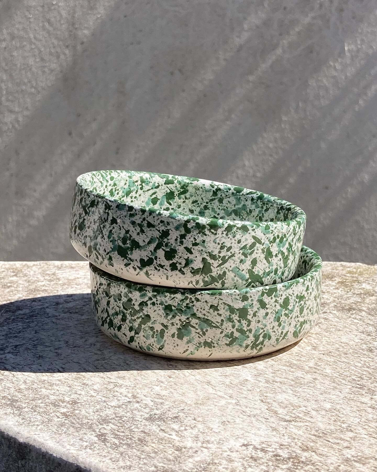 Two speckled ceramic cups