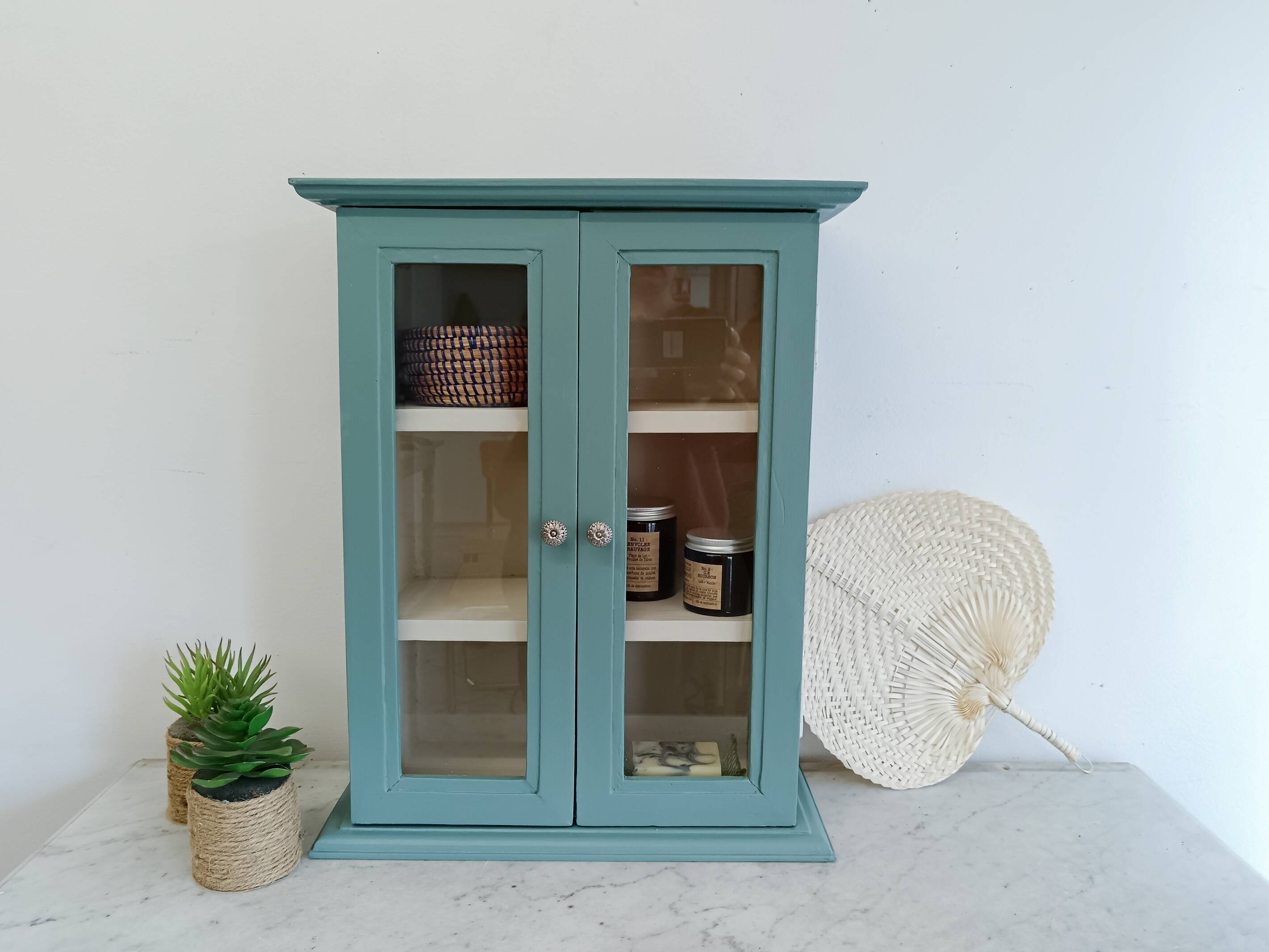 Green and beige 2-door wall display case