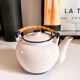 Teapot in sandstone and rose handle