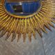 Miroir soleil en métal doré 62cm