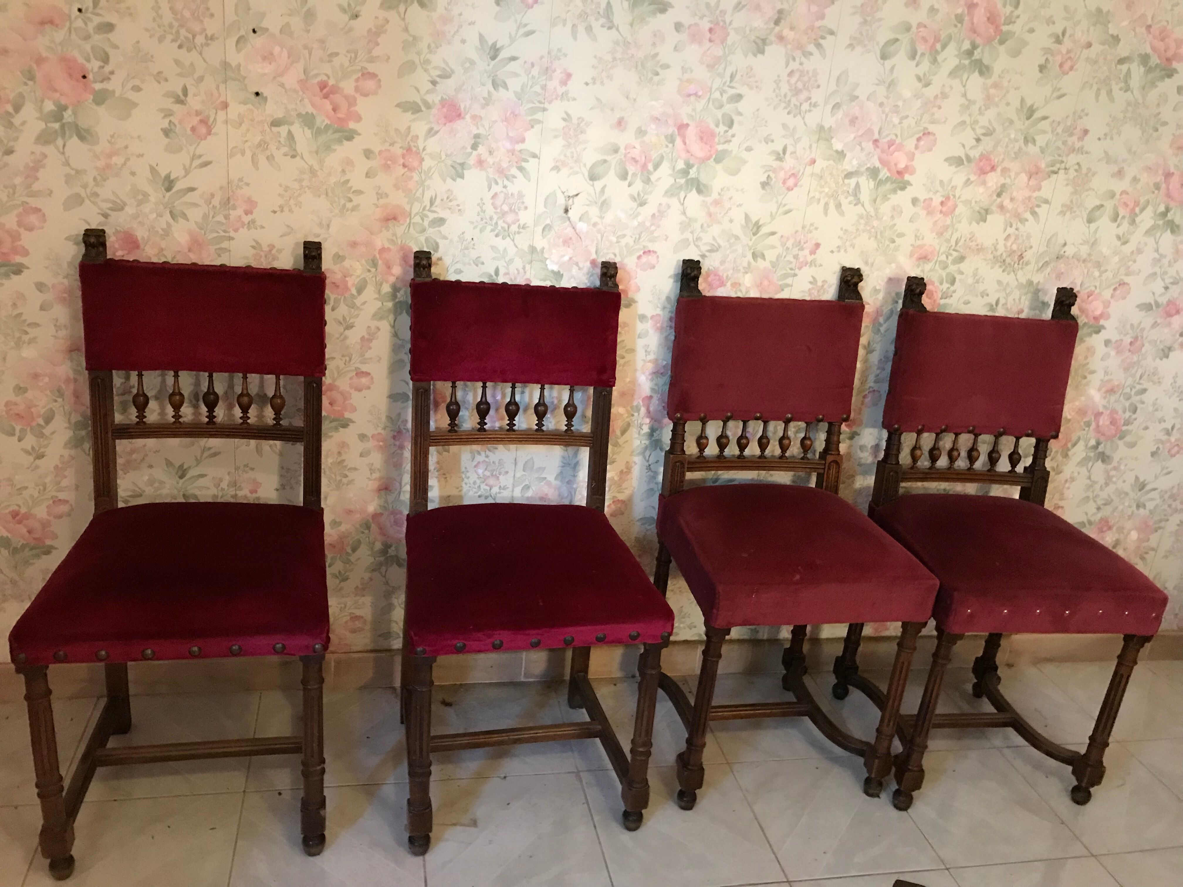 Henri II style chairs covered with red velvet fabric