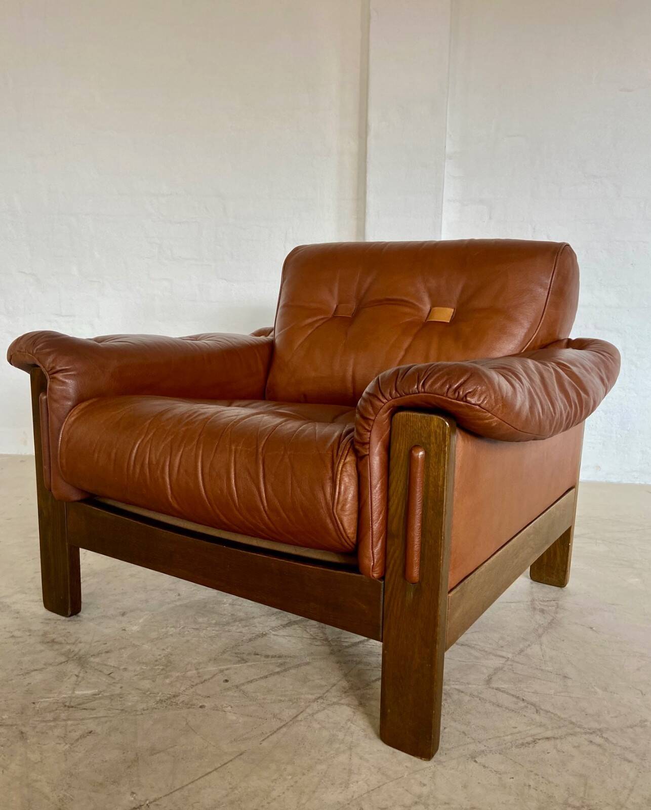 Mid-century vintage Scandinavian leather lounge chair in cognac brown leather