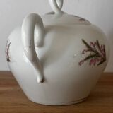 Beautiful vintage porcelain sugar bowl with a floral pattern.