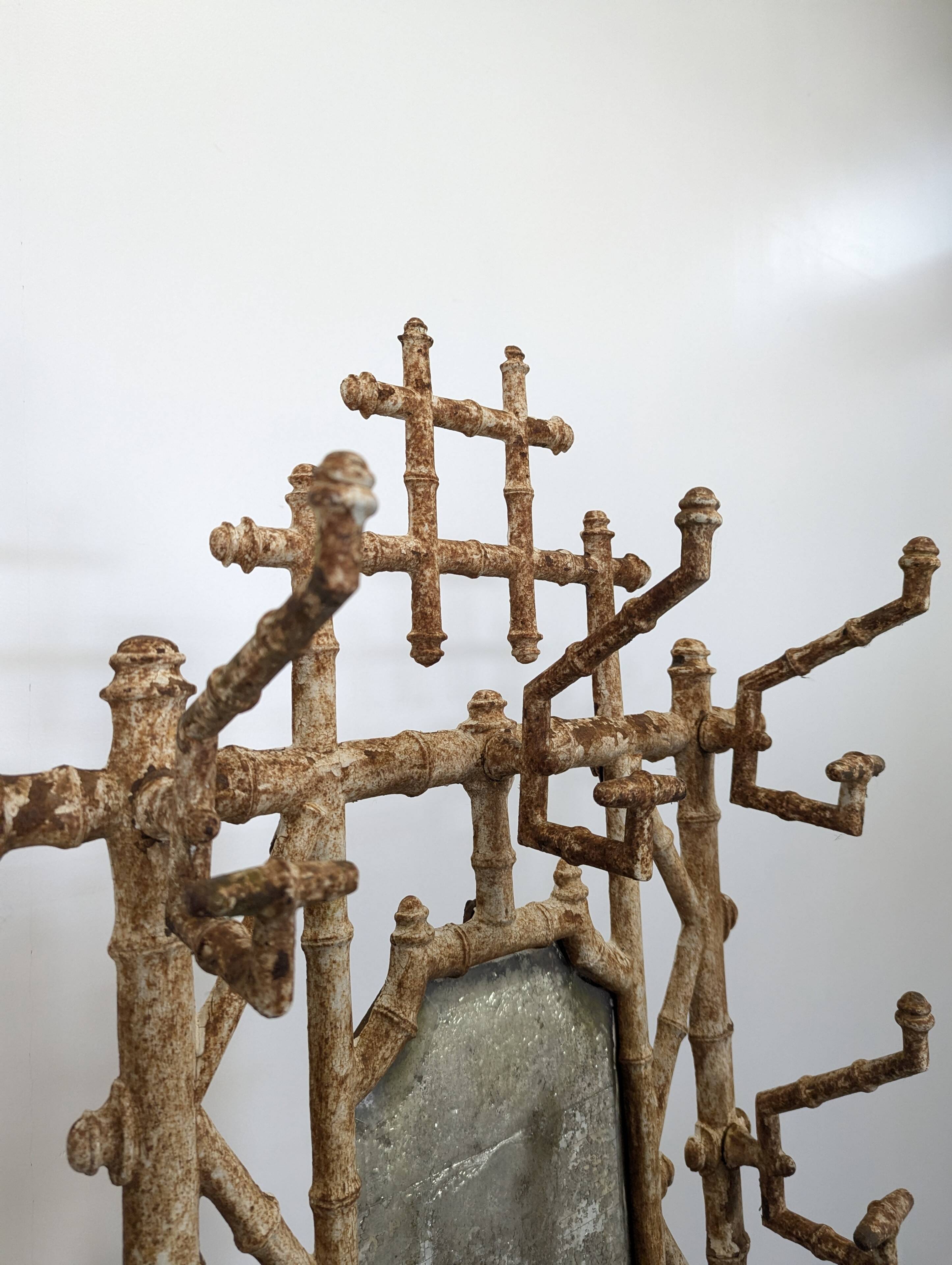 Cast iron and faux bamboo locker by Deville Pailliette, 1900