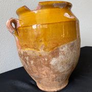 Old grease pot in glazed yellow terracotta, France nineteenth century