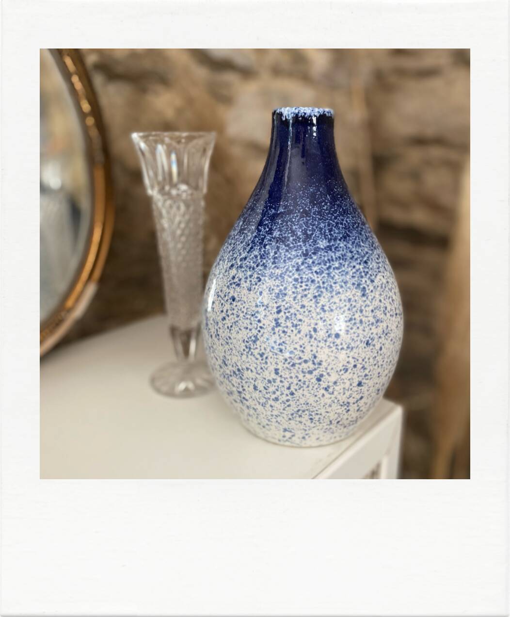 Blue and white speckled vase