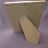 Old wooden and gilded stucco frame