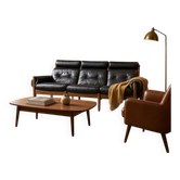Fauteuil/canapé/salon vintage en cuir noir Eric Merthen