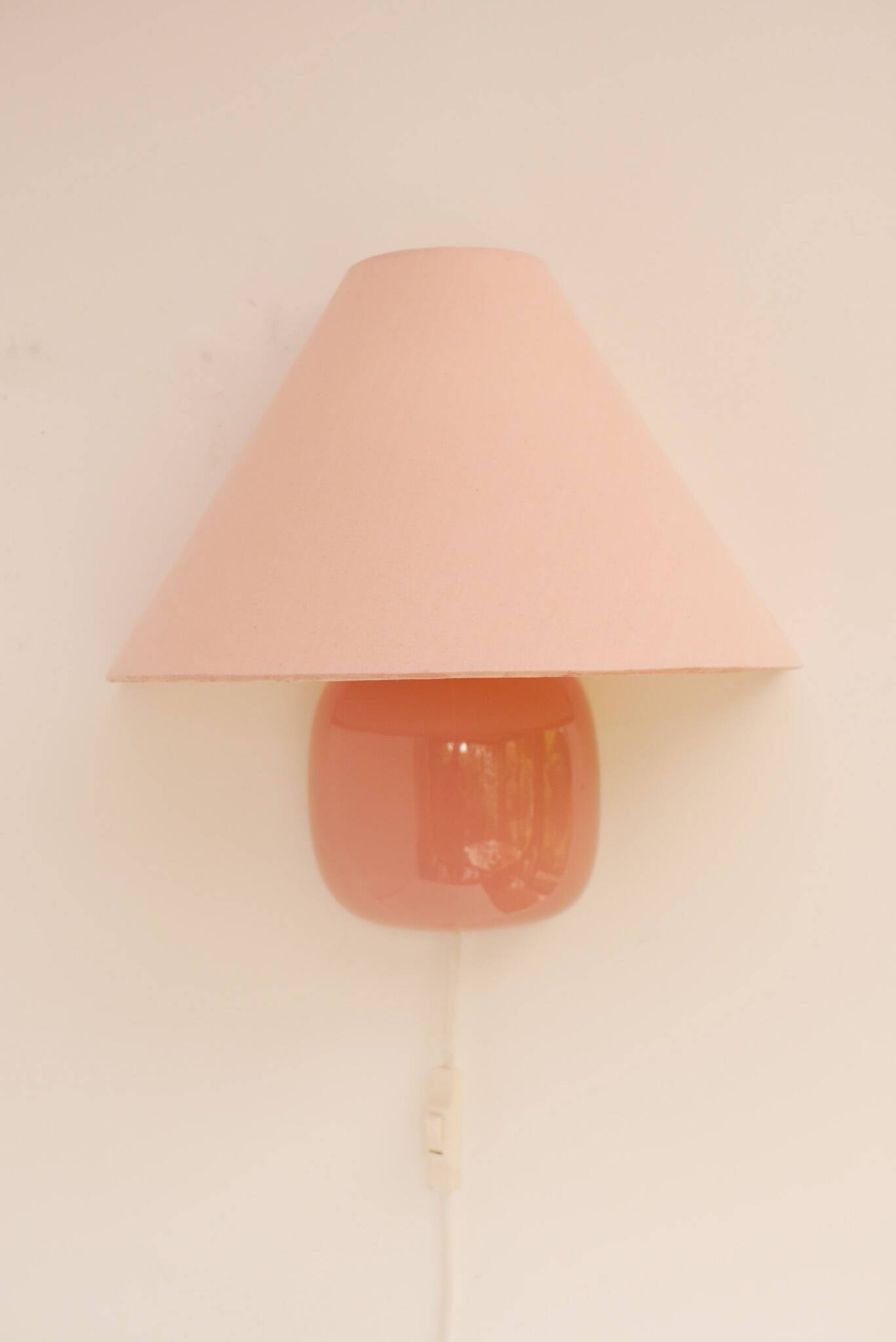Vintage IKEA 80s sconce. A wall mounted lamp classic semi-round in pink
