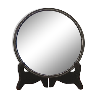 Round mirror on vintage tripod serving dish