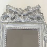 Louis XVI Style Mirror in Carved Wood with Grey Patina and Dove Pediment
