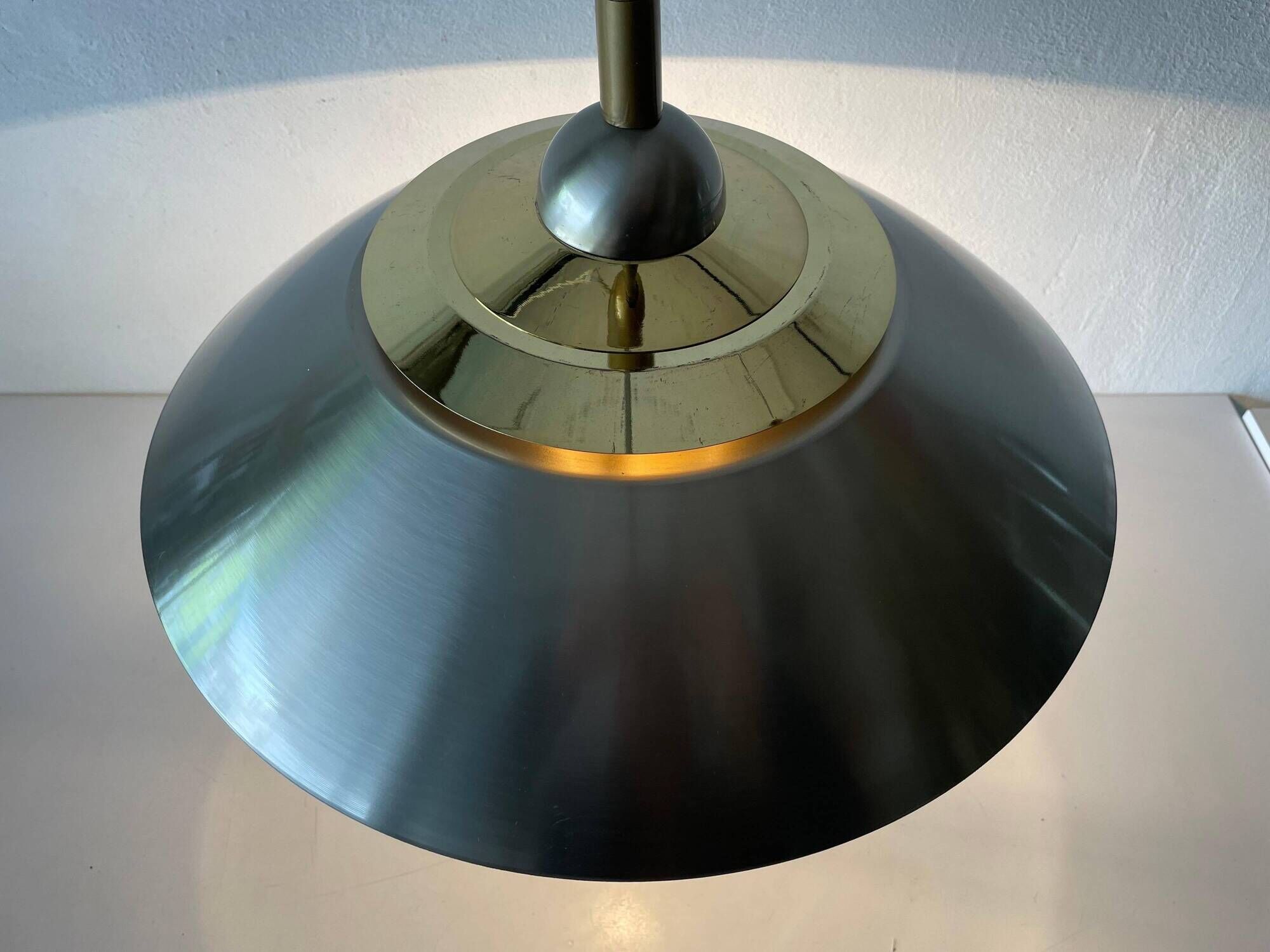 Suspended lamp in chrome and gold metal by TZ, 1970s, Germany.