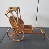 Pousse pousse pour poupée en rotin tressé
