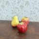 Salt and pepper shakers in slurry fruit