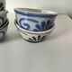 7 stoneware bowls with blue and green ocean-inspired decoration