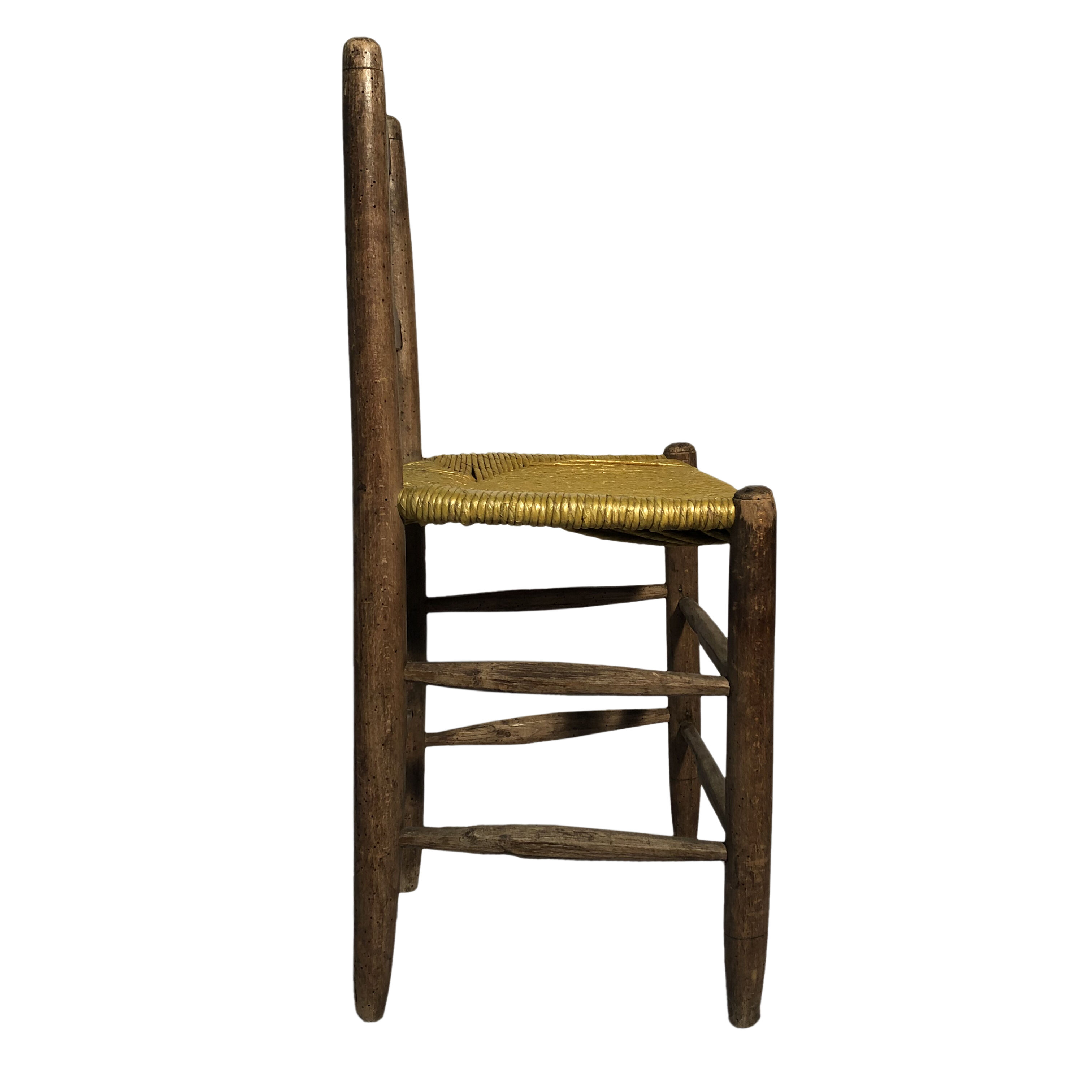 Old wooden chair, mulched seat
