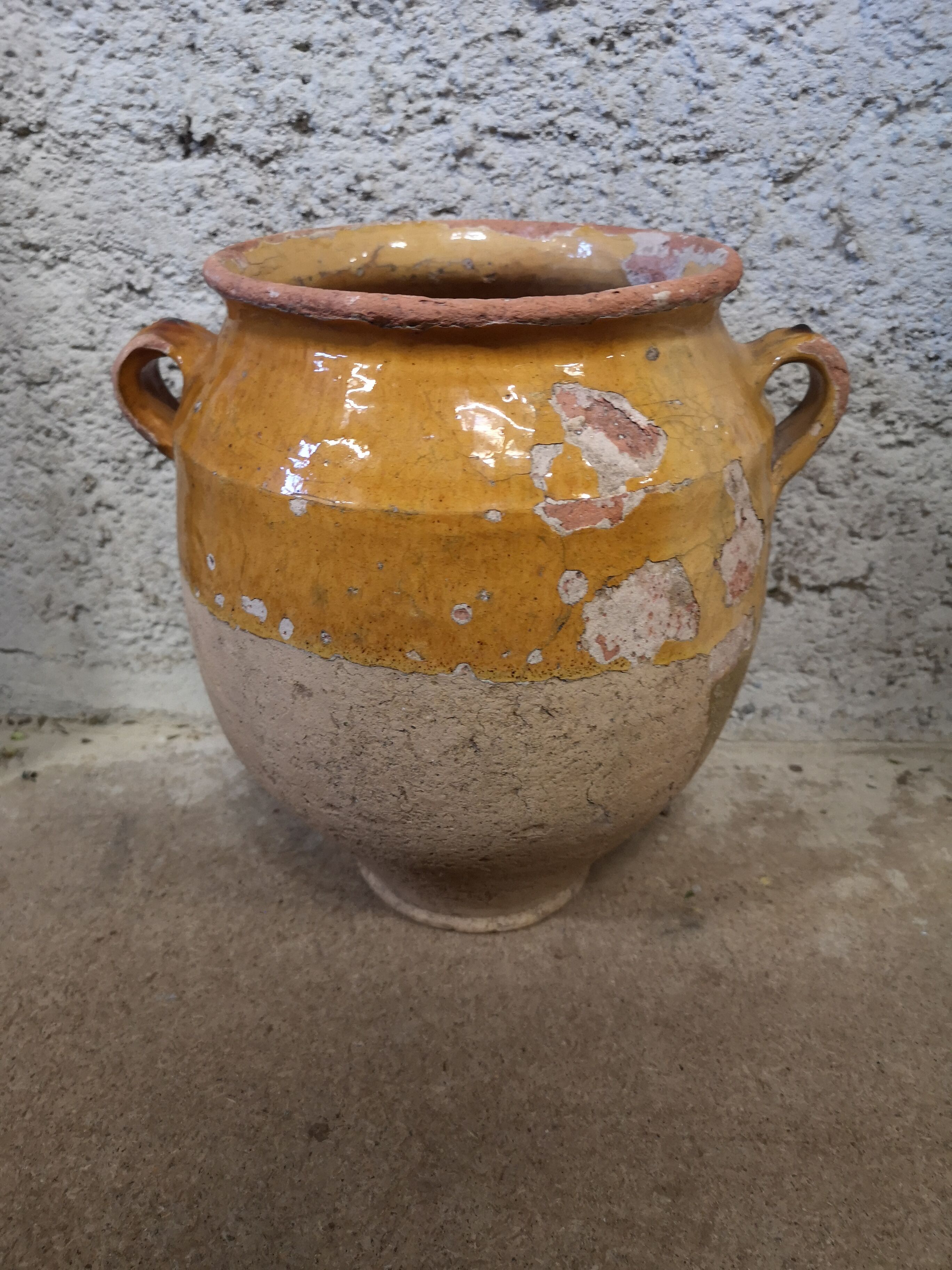Ancient yellow sandstone pot