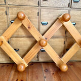 Pine accordion coat rack