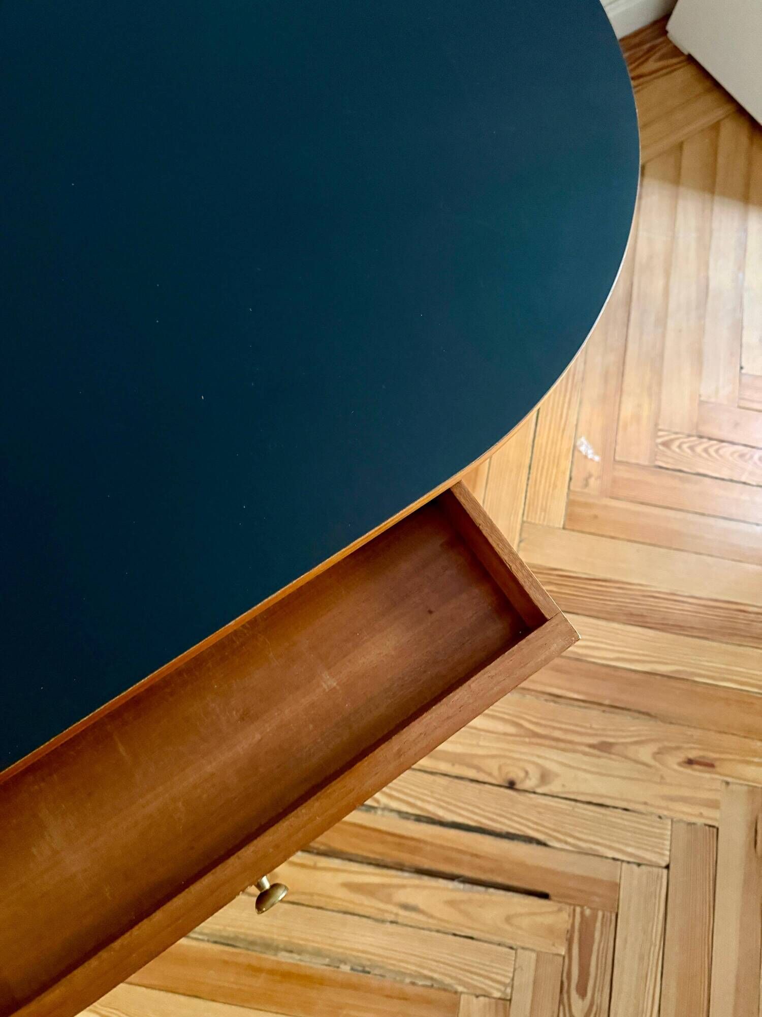 French desk "Prouve" in walnut, bronze and rubber from the 1970s.
