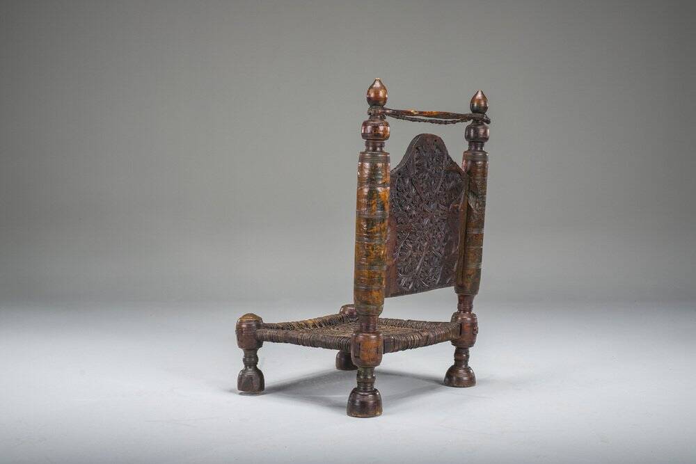 Early 20th century handmade low cedar chair, Nuristan, 1890s