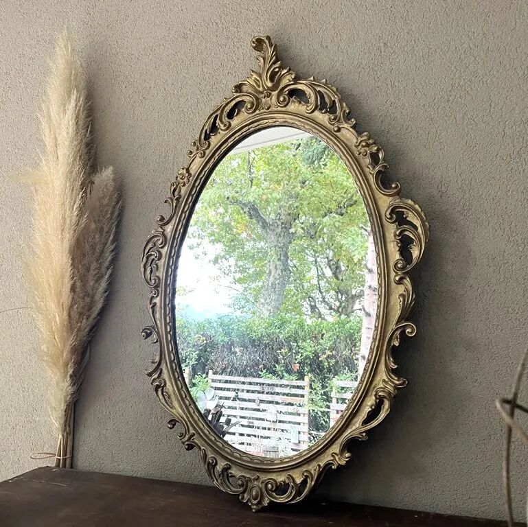 Oval mirror in Baroque style