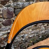 Pair of wooden and black metal chairs