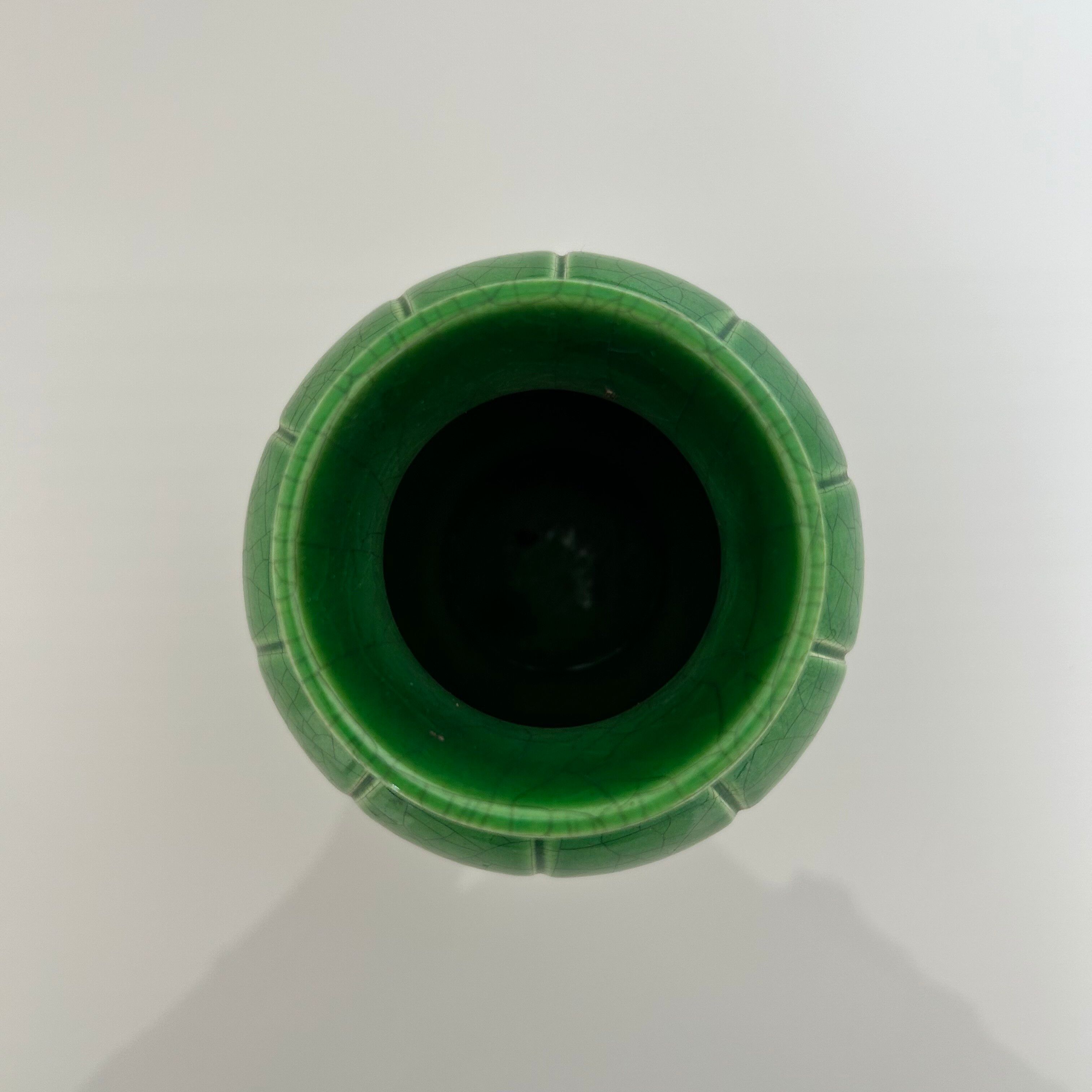 Cracked green round vase