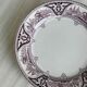 Plate with purple oriental decoration
