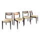 Lot of 4 vintage Scandinavian chairs in wood and golden fabric.