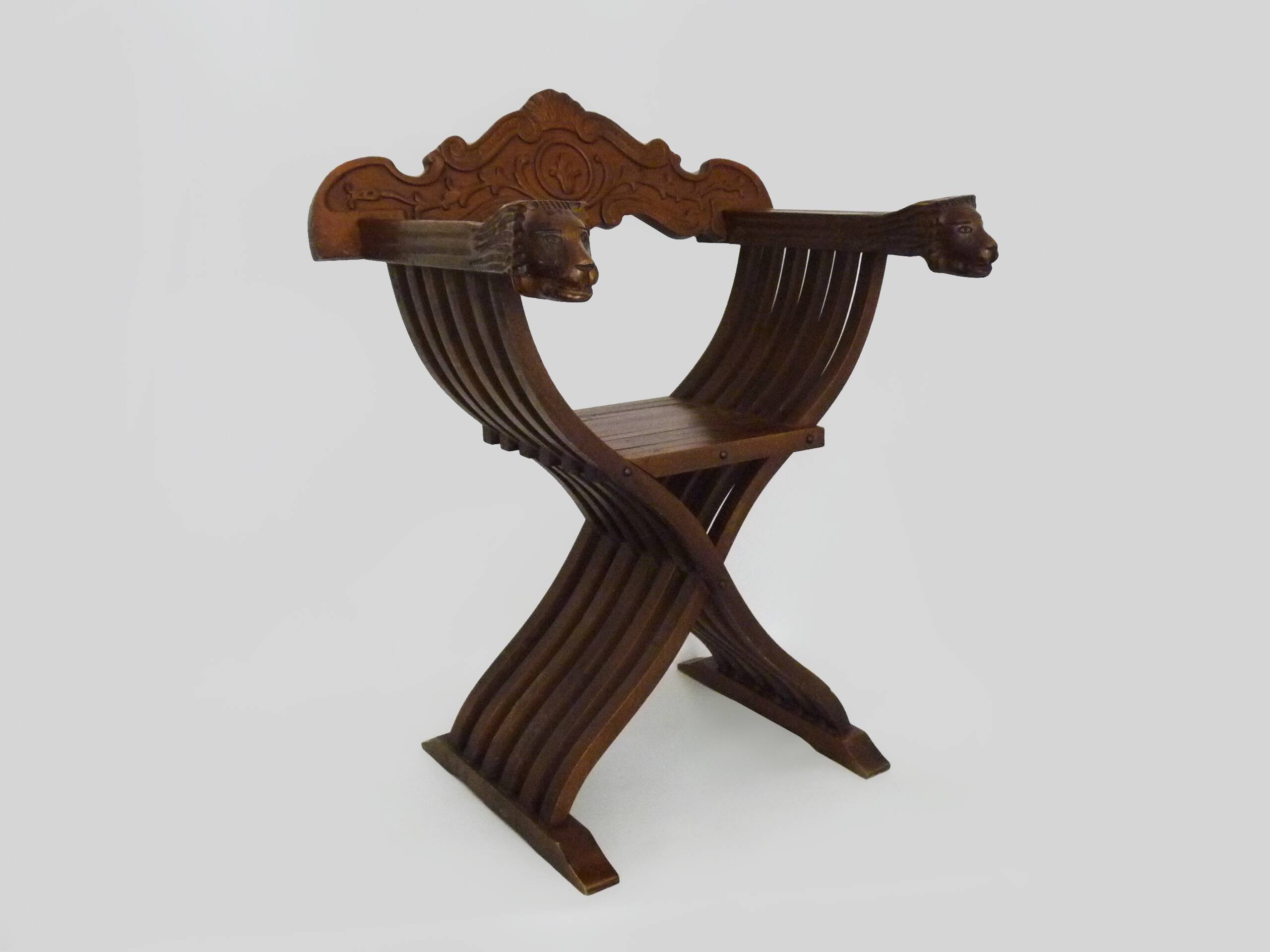 Vintage Savonarola chair with lion head, wood, Italy, 1950s