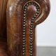 Sturdy, stately and subtle vintage sheepskin club chair