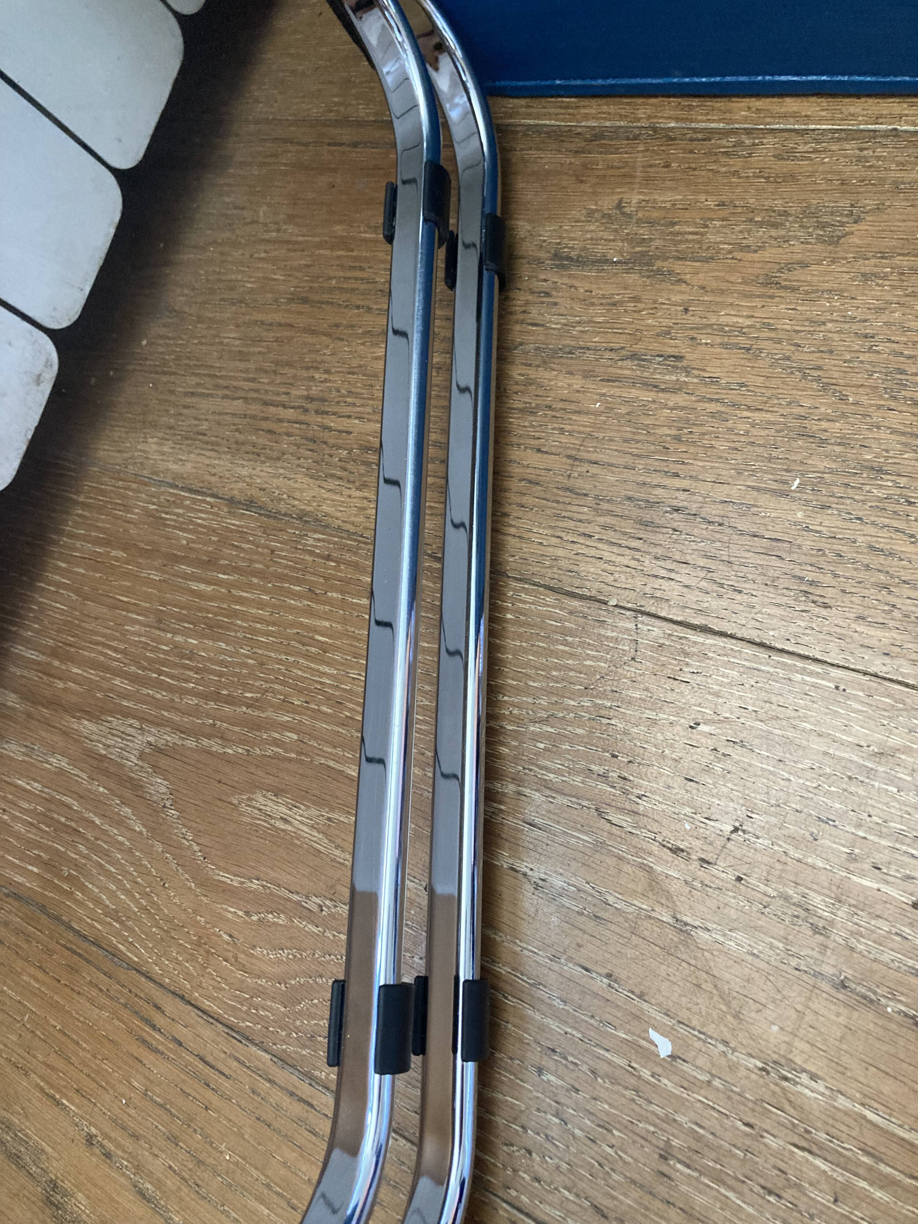 Plia chairs by Castelli in wood and cane.